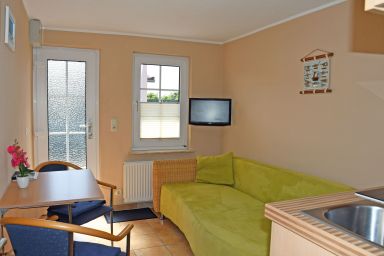 ruhig gelegene Ferienwohnungen mit Sonnenterrassen - Ferienwohnung petit mit Sonnenterrasse