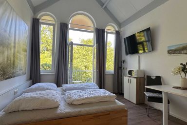 Kleine NordseePerle in Tossens mit Balkon - Ferienwohnung 648