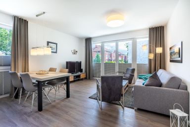 Aparthotel Ostseeallee - Tolles Familienapartment mit sonniger Terrasse und zwei Bädern in Strandnähe