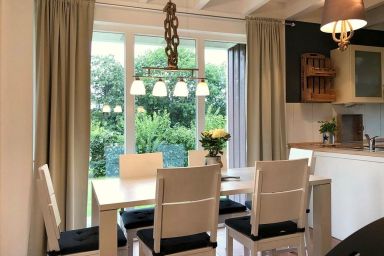 NordseeResort Friesland Ferienhäuser - Top Ferienhaus am Deich, Terrasse, Balkon mit Meerblick, Sauna, Hot-Tub & Kamin!