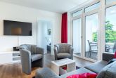 Wohn-/Essbereich mit Zugang zur Loggia