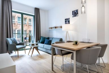 Krusespeicher - Modernes Hafenapartment für 3 Personen mit Balkon und hauseigenem Saunabereich