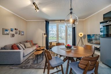 Ferienwohnung Terrasse am Haff - Ruhige Ferienwohnung am Stettiner Haff mit Balkon & Sauna, nah an See & Meer
