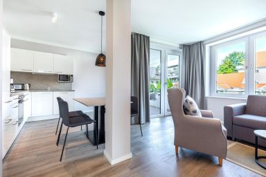 Ferienwohnungen am Godewindpark Travemünde - Modernes Apartment für bis zu 6 Personen mit Wellness und Balkon in Strandnähe