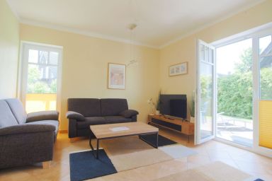 Parkstr. 13 Fewo Strandkrabbe - Gemütliche 60m² Ferienwohnung mit Terrasse, Kamin & 2 Schlafzimmern