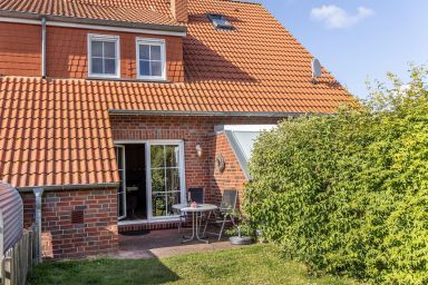 Ferienhaus 50056 - Dieses  Reihenmittelhaus besticht mit seiner freundlichen Einrichtung. Auf ca. 62 qm haben 4 Personen und 1 Kleinkind genügend Platz..