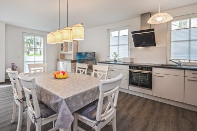 Wolfs Reetdachhaus mit Sauna, Terrasse und Garten - Reetdachhaus