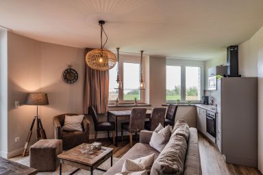 Ferien auf Krautsand GmbH - Elbaussicht Appartement D3 R2 - Balkon mit Elbblick