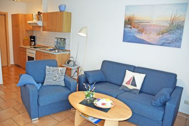 Ferienwohnungen an der Hagenschen Wiek auf Rügen - Ferienwohnung Vilm mit Sonnenterrasse
